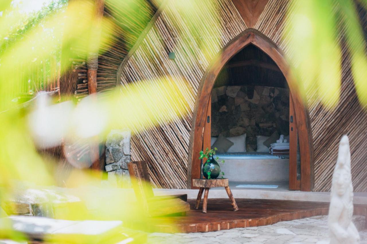 Ikal Tulum Hotel Eksteriør billede The entrance to the chapel