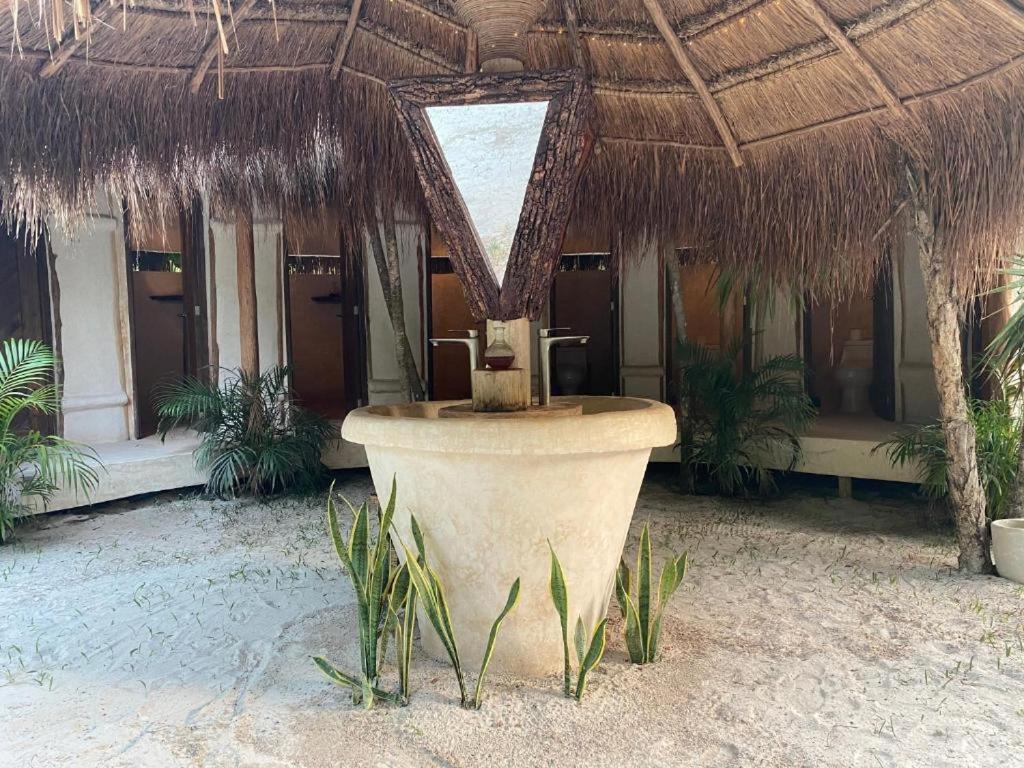 Ikal Tulum Hotel Eksteriør billede Fountain at the entrance of the spa