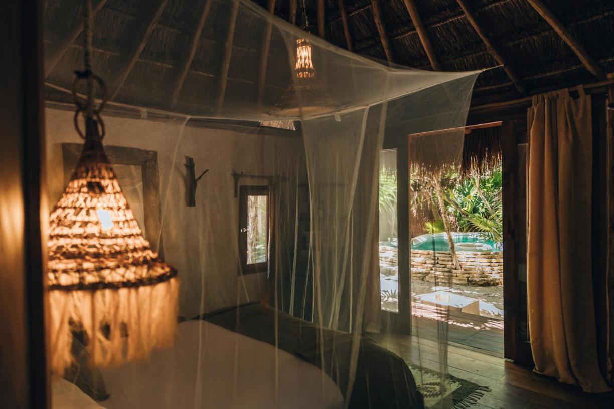 Ikal Tulum Hotel Eksteriør billede Interior of a bungalow